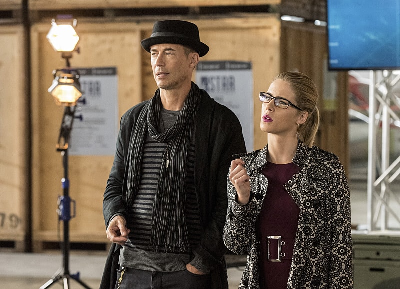 The Flash -- "Invasion!" -- Image FLA308b_0258b.jpg -- Pictured (L-R): Tom Cavanagh as Harrison Wells and Emily Bett Rickards as Felicity Smoak -- Photo: Dean Buscher/The CW -- ÃƒÂ‚Ã‚Â© 2016 The CW Network, LLC. All rights reserved.