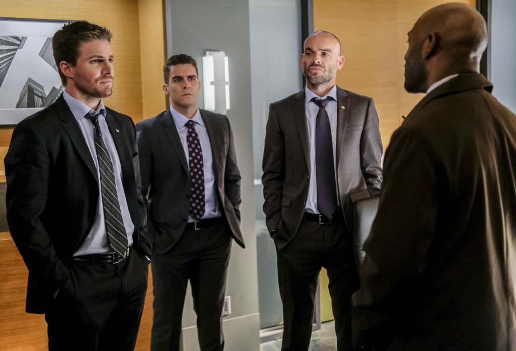 Arrow -- "The Sin-Eater" -- Image AR514a_0083b.jpg -- Pictured (L-R): Stephen Amell as Oliver Queen, Josh Segarra as Adrian Chase, Paul Blackthorne as Quentin Lance and Adrian Holmes as Captain Frank Pike -- Photo: Robert Falconer/The CW -- ÃƒÂ‚Ã‚Â© 2017 The CW Network, LLC. All Rights Reserved.
