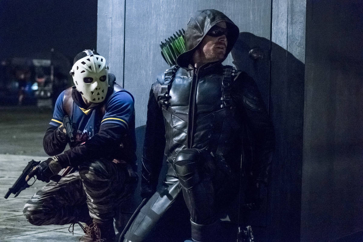 Arrow -- "Second Chances" -- Image AR511b_0401b.jpg -- Pictured (L-R): Rick Gonzales as Rene Ramirez/Wild Dog and Stephen Amell as Green Arrow -- Photo: Katie Yu/The CW -- ÃƒÂ‚Ã‚Â© 2017 The CW Network, LLC. All Rights Reserved.
